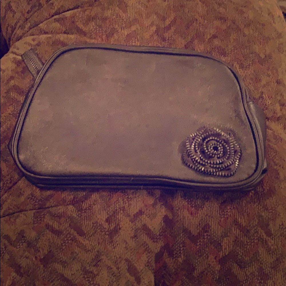 Cosmetics hand held bag. Lancôme pairs.